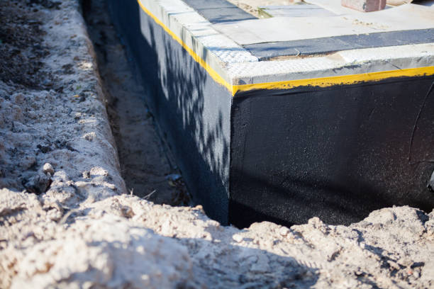 Professional Waterproofing technician working in Fowler, IN